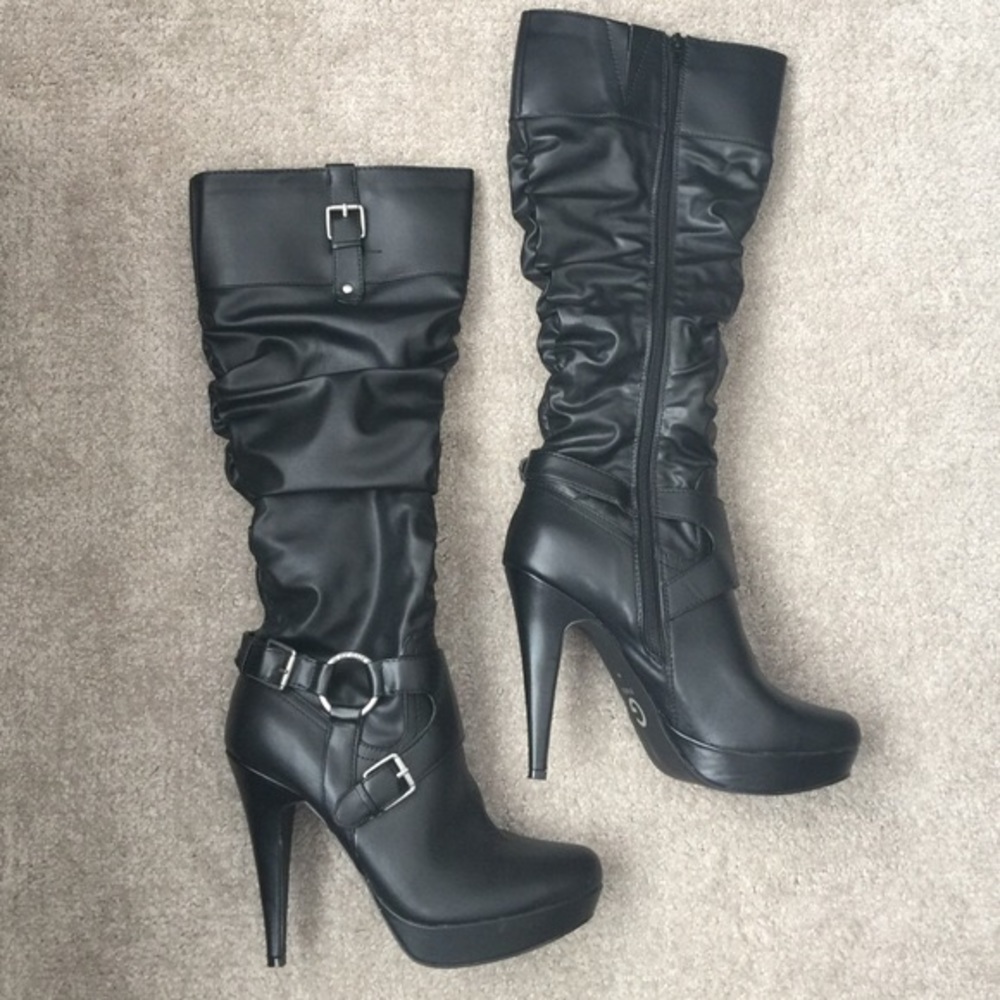 Black high heeled boots by Guess
